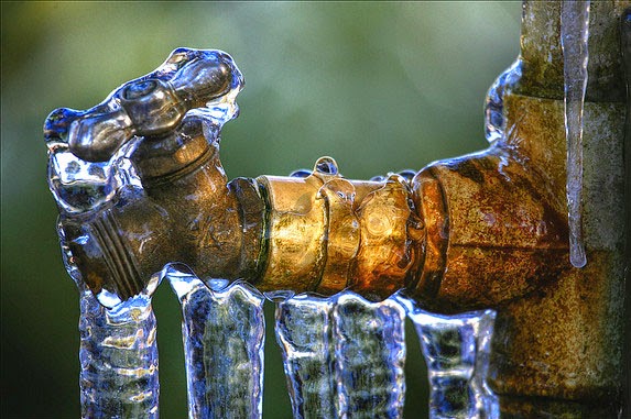 Leaking faucet that has frozen over.